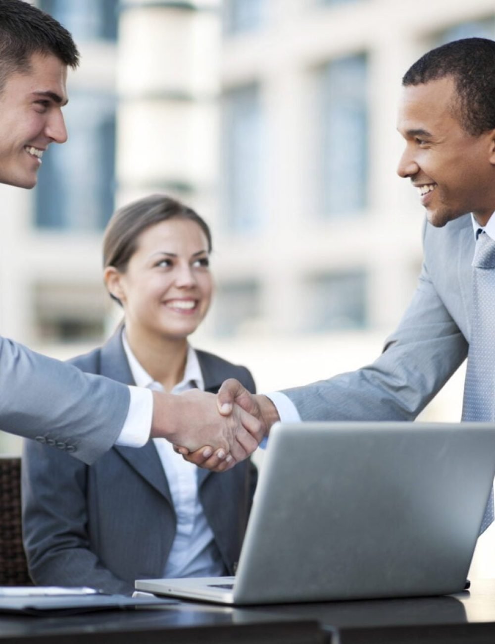 Two businessmen are shaking hands at the meeting.

[url=http://www.istockphoto.com/search/lightbox/9786622][img]http://img543.imageshack.us/img543/9562/business.jpg[/img][/url]

[url=http://www.istockphoto.com/search/lightbox/9786738][img]http://img830.imageshack.us/img830/1561/groupsk.jpg[/img][/url]