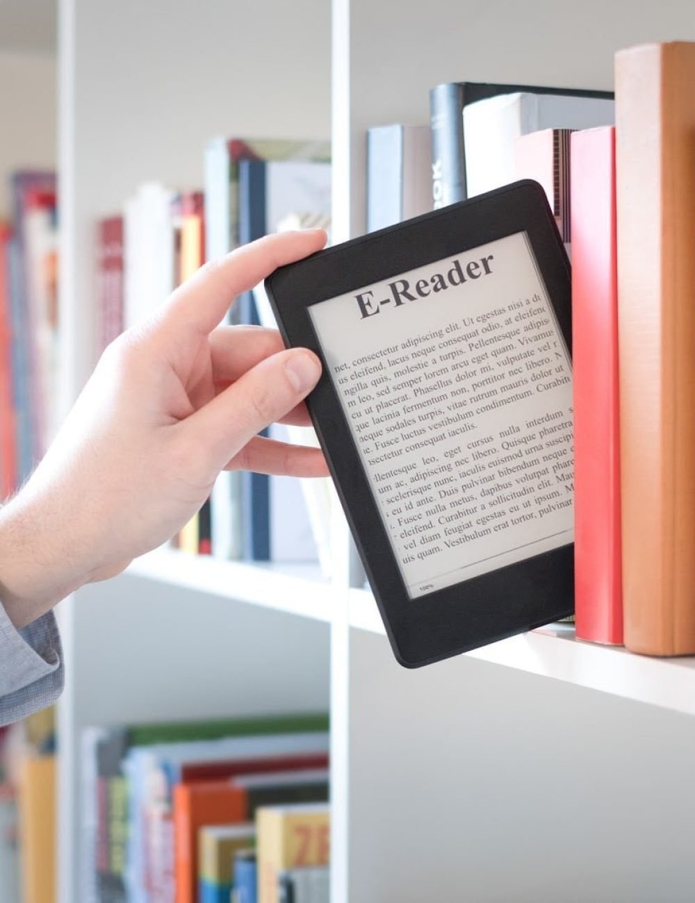 E-book reader on a stack of books